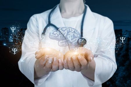 Doctor examines the psyche and consciousness on blurred background.