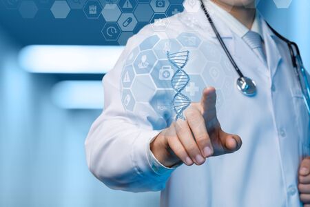 The concept study of the DNA of the patient. The doctor clicks on the DNA molecule.の写真素材