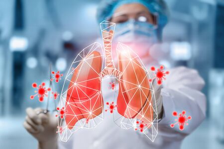 The concept of treatment for viral lung diseases. The doctor clicks on the patient lungs infected...