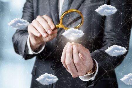 Businessmen explores network connections on a blurry background.の写真素材