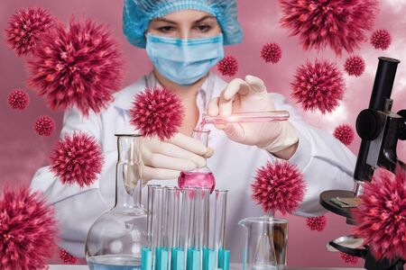 Doctor conducts a coronavirus sample test. The doctor conducts research on the background of viruses.の写真素材