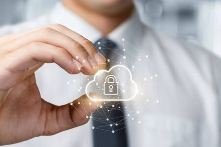 The concept of digital data protection.A business plan shows a cloud with a lock.の写真素材