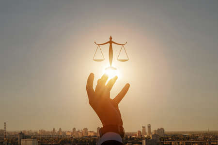 The concept of support and treatment of the lungs.Woman supports the lungs icon on a blurred background.の写真素材