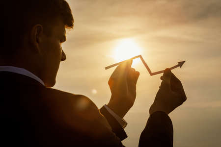 The concept of support and treatment of the lungs.Woman supports the lungs icon on a blurred background.の写真素材