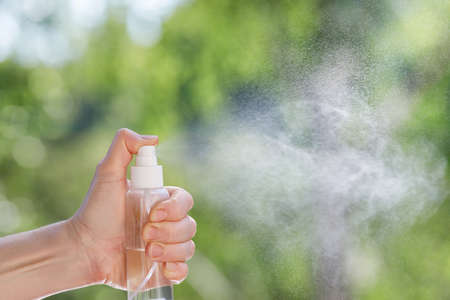 The concept of disinfection and cleaning. Hand presses the spray and spray disinfection.の写真素材