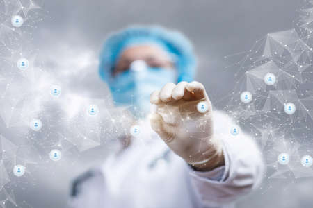 Treatment of patients using the Internet. Doctor shows a pill on the background of the web.
