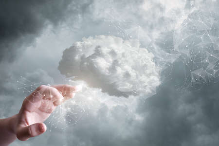 The concept of working with artificial intelligence and the brain in the form of a cloud on the network.の写真素材