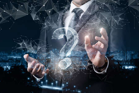 The concept of a businessman answers questions on the net.の写真素材