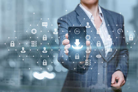 Businesswoman shows the download icon in the phone on a blurred background.