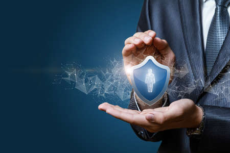 The concept of insurance and protection of human resources in business.の写真素材