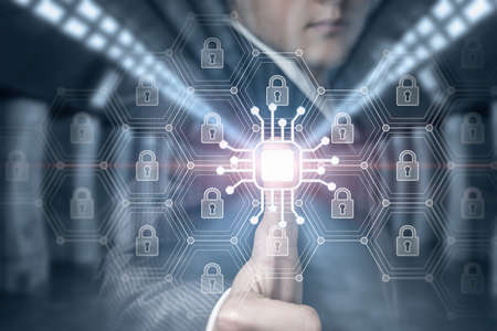 Business man unlocks security system with fingerprint.