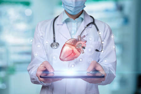 Concept of treatment diagnosis of heart disease with the help of new technologies.の写真素材