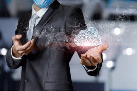 Business man shows cloud computing on blurred background.の写真素材