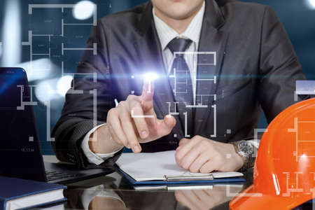 Architect working with a project on a virtual computer screen.