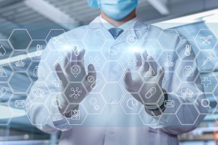Male doctor working on a virtual computer screen.