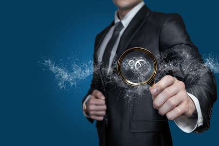 Business man examines the mechanism of brainstorming and innovative ideas.