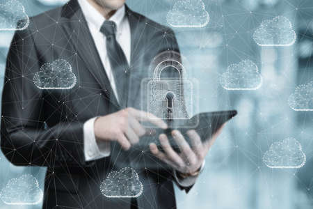 Communications engineer set up network protection using a mobile computer.