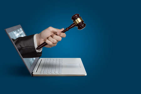 The concept of legal protection through a computer on the internet.の写真素材