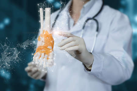 The concept of treatment of research and examination of the patient ankle joints.の写真素材