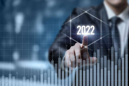The concept of the coming of the financial successful new year 2022.