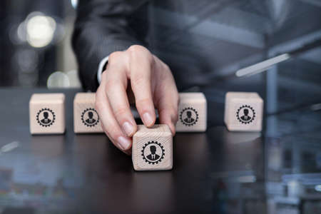Business man chooses executive from human resources on blurred background.の写真素材