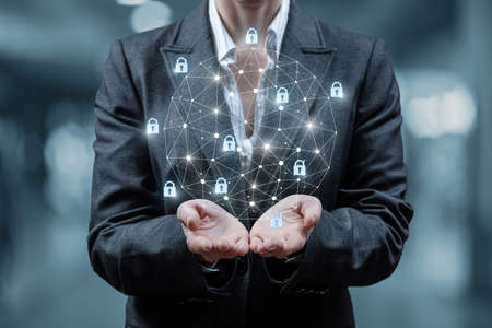 Business woman shows security system and network connection protection.の写真素材