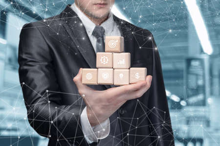 Business man shows movement algorithm while planning goals in business.の写真素材