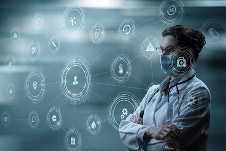 Doctor thinks and looks at a virtual computer on a dark background.の写真素材