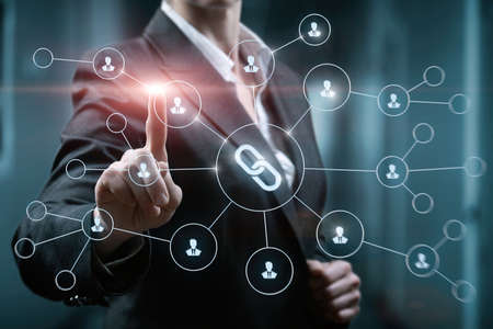 Business woman clicks settings link on blurred background.の写真素材