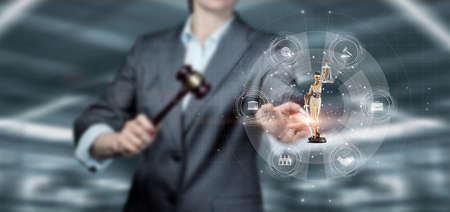 Lawyer works on a virtual computer interface on a blurred background.