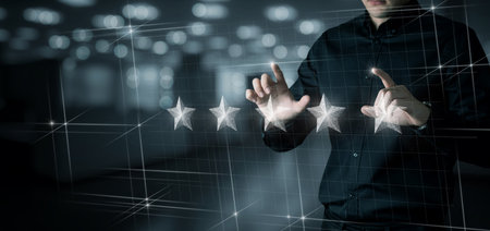 A man shows a five star rating on a virtual computer screen.