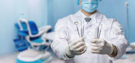 Dentist service concept. Dentist stands with a tool in front of a virtual computer screen on a blurred background of a polyclinic.の写真素材
