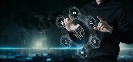 Man working on virtual screen with fingerprint scanning interface.