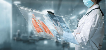 Doctor working on virtual computer screen with examination of patient lung.