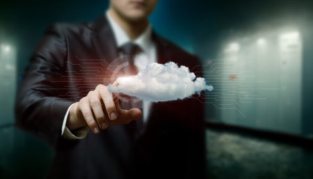 A man in a suit flies on a computing cloud on a blurred background.