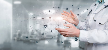 Woman showing network connection on blurred background of medical facility.の写真素材