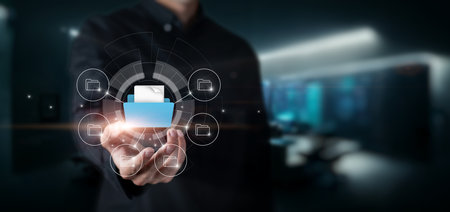 Business man shows file system on virtual computer screen.