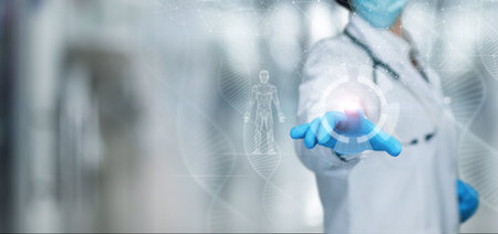 Doctor clicks on a virtual computer screen and examines a patient.の写真素材