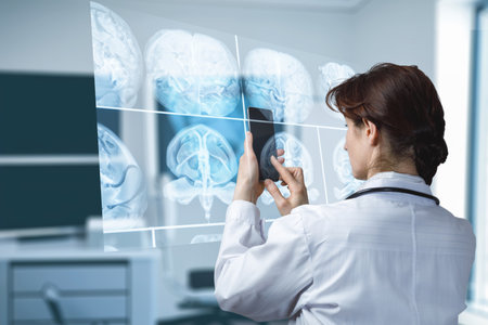 The doctor studies X-rays on a mobile device and a virtual computer screen.