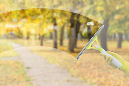 Concepts of window cleaning service during autumn.の写真素材