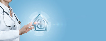 The doctor shows the medical facility icon on a blue background.の写真素材