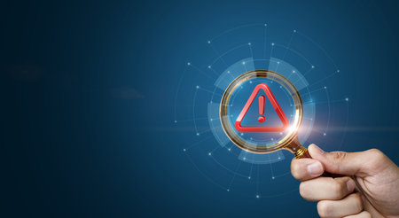 Concept of error testing. A magnifying glass shows an error icon on a blue background.の写真素材