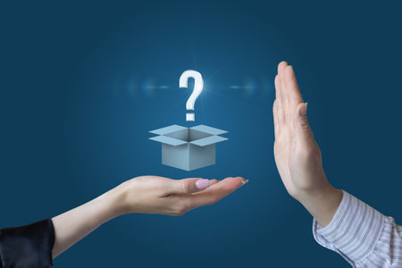 Concept of product deviation where there are questions. While displaying a box with a product to which a question appears and the second hand prohibits.の写真素材