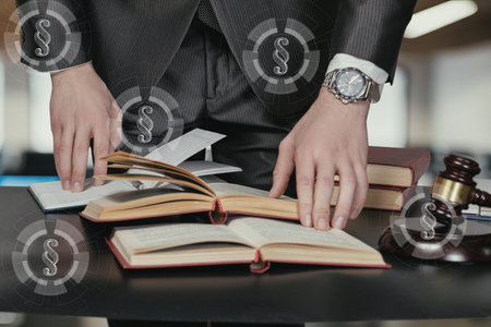 Legal research by a lawyer in the office. The process of a lawyer studying laws and documents.の写真素材