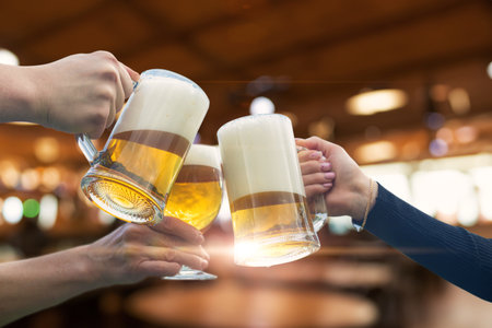 Fun and friendly communication in a beer bar. Spending time together.の写真素材