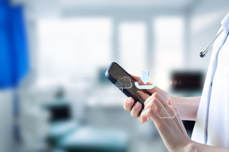 The concept depicts a doctor uploading or downloading medical data from the cloud to a mobile device.の写真素材