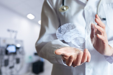 Digital medicine Brain hologram. A doctor holds up a holographic image of a brain against the...
