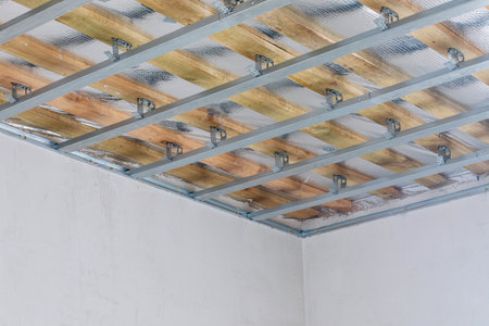 Installation of suspended ceiling. Installation process of suspended ceiling with metal frame.の写真素材