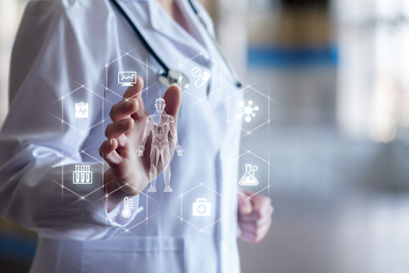 A health professional in a lab coat uses a transparent screen to interact with various health-related data visualizations. The background suggests a clinical environment focused on patient care.の写真素材
