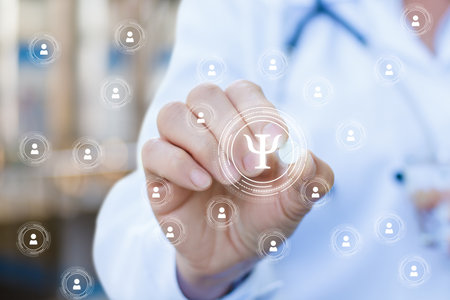 A healthcare professional interacts with digital icons representing mental health treatment.の写真素材